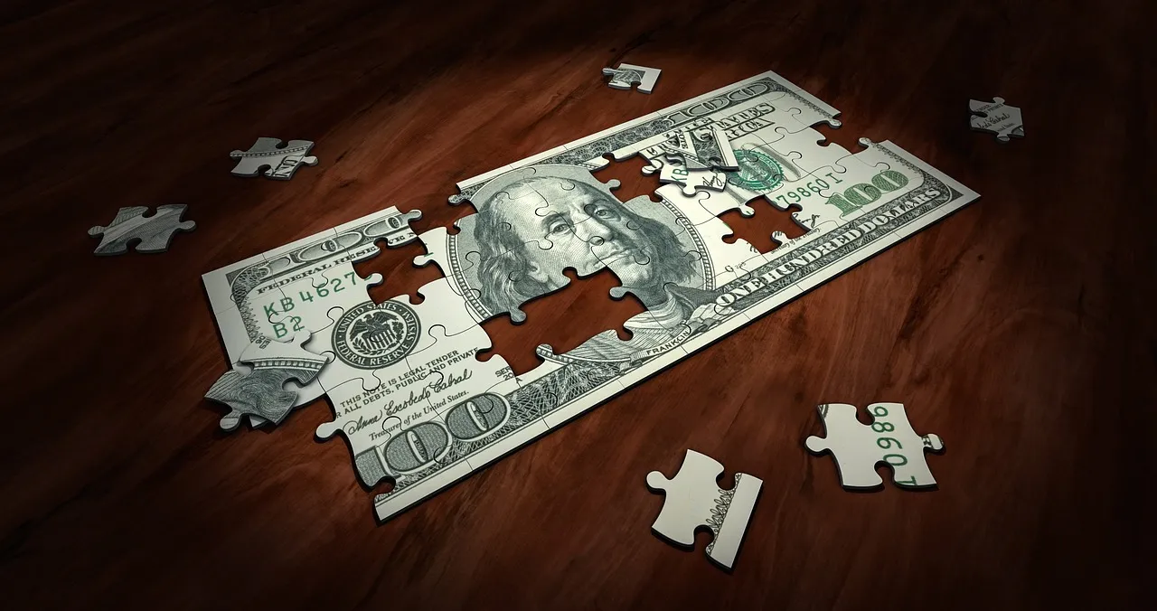 Photo showing puzzle, money, business and finance.