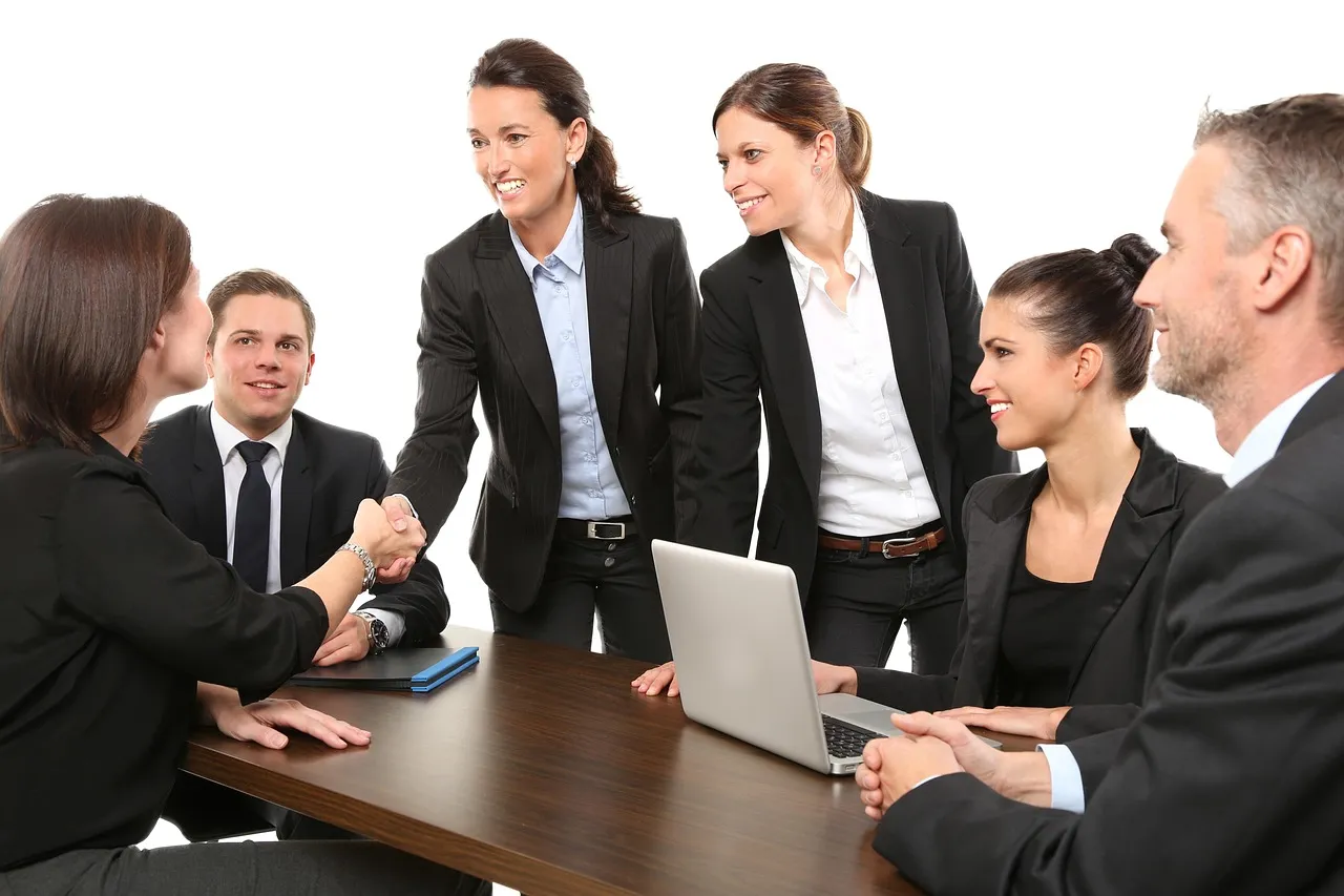Photo showing people, business and meeting.