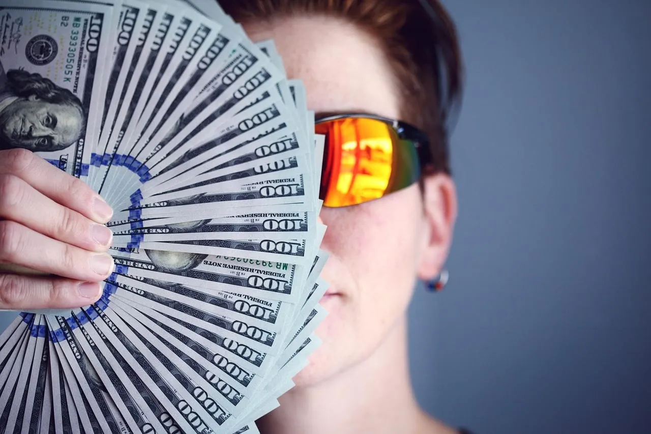 Photo showing dollers, money, banknotes and financial planning.