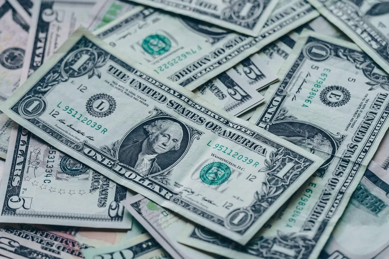 Photo showing bills, cash, usd and money.