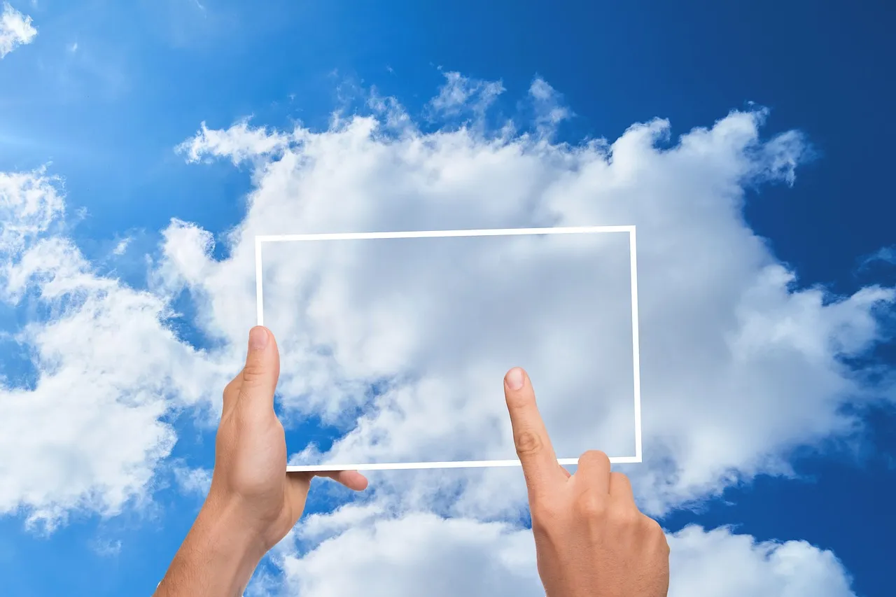 Photo showing cloud, finger, tablet and storage.