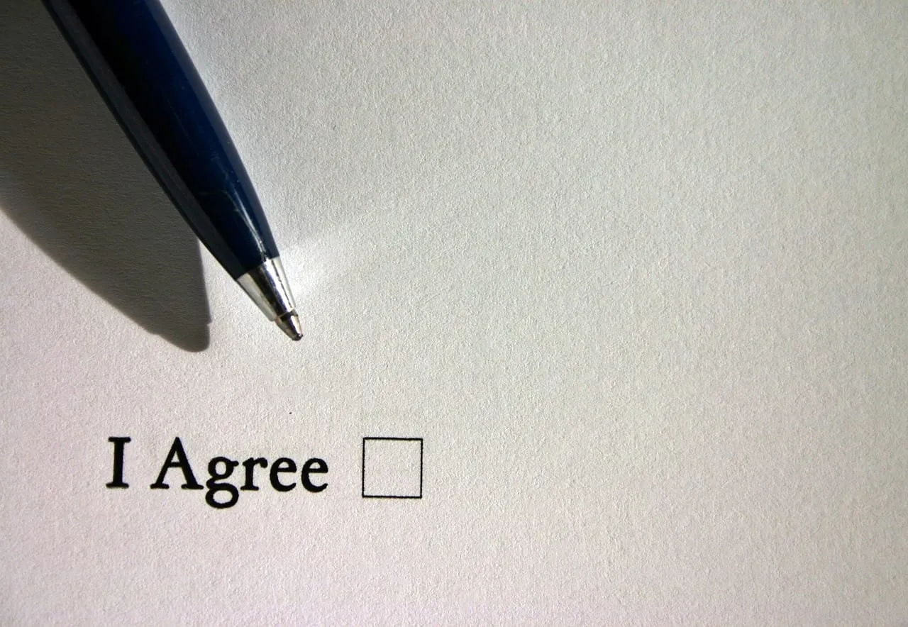 Photo showing consent, mark with a cross, english and check off.