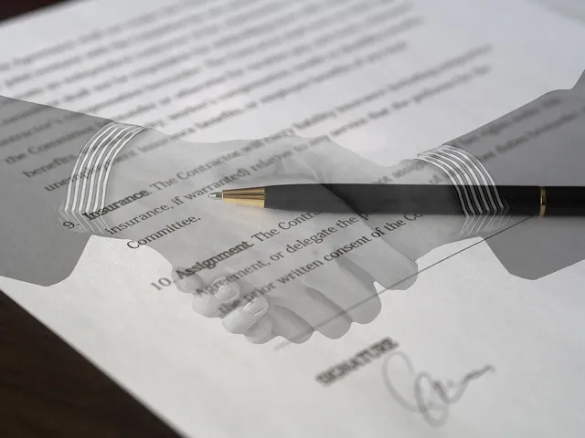 Photo showing contract, agreement and signature.