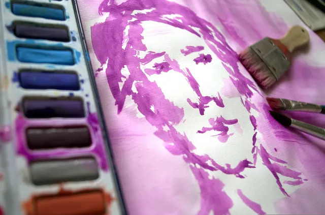 Photo showing man, face and painting.