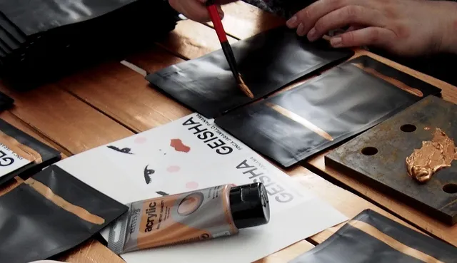 Photo showing art, packaging and design.