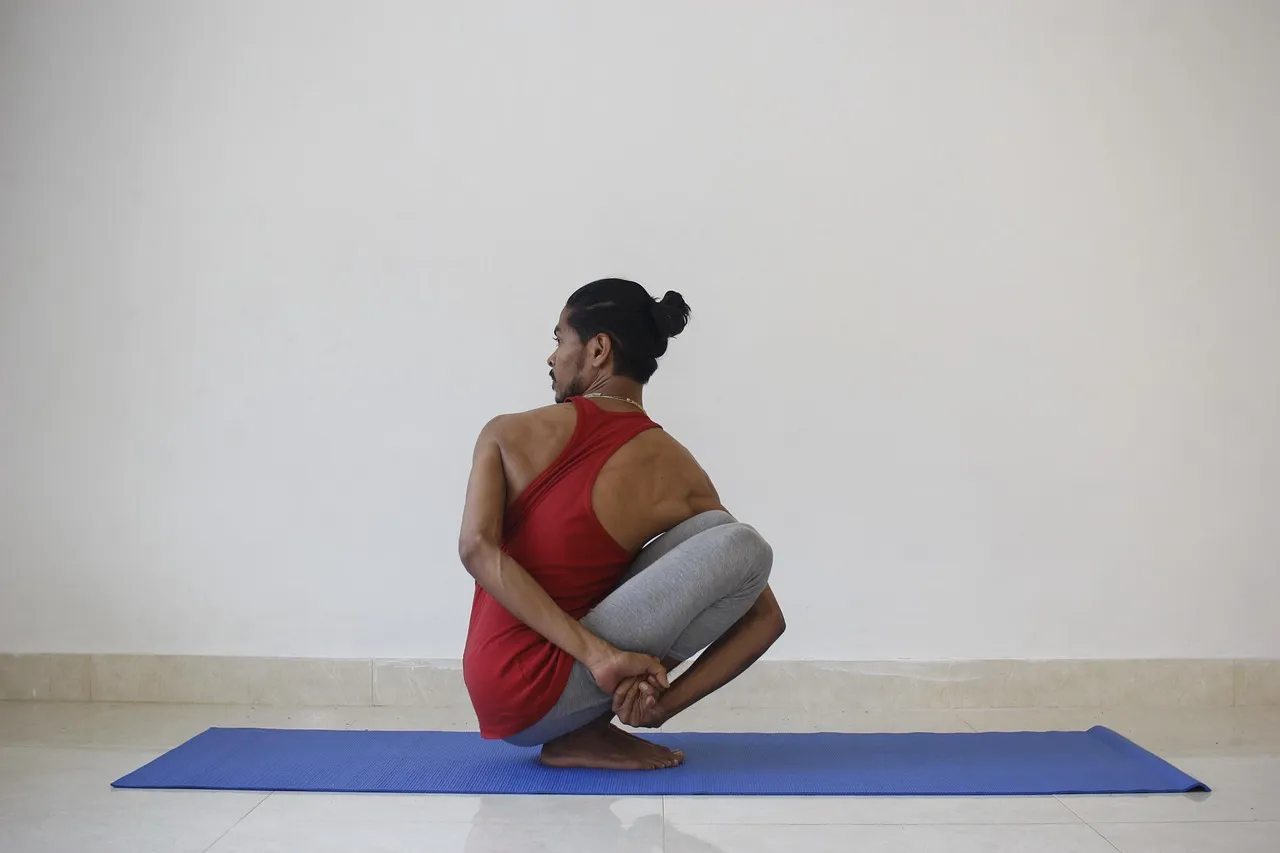 Photo showing yoga, yogi, male and exercise.