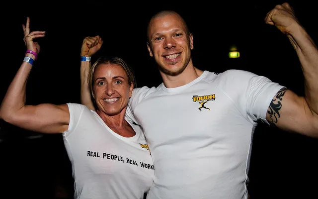 Photo showing couple, fit and personal trainers.