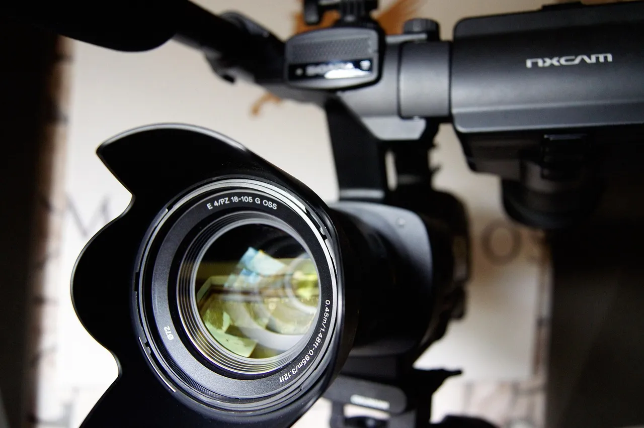 Photo showing camera, film and recording.
