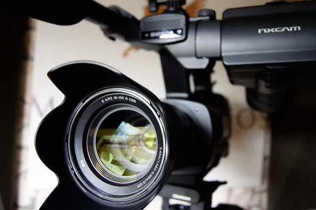 Photo showing camera, film and recording.