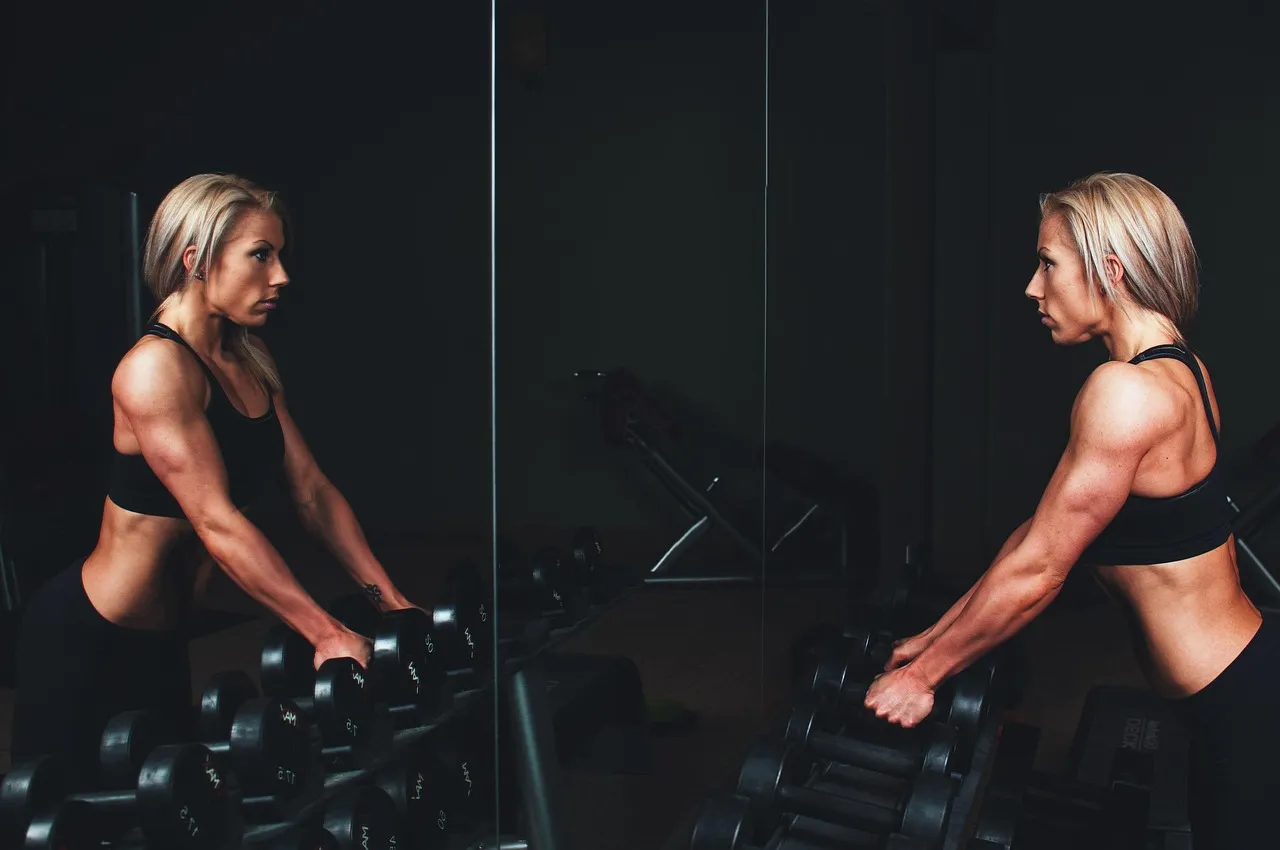Photo showing training, muscles, arms and blonde.