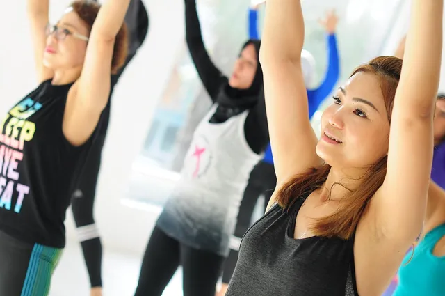 Photo showing female, group and fitness.