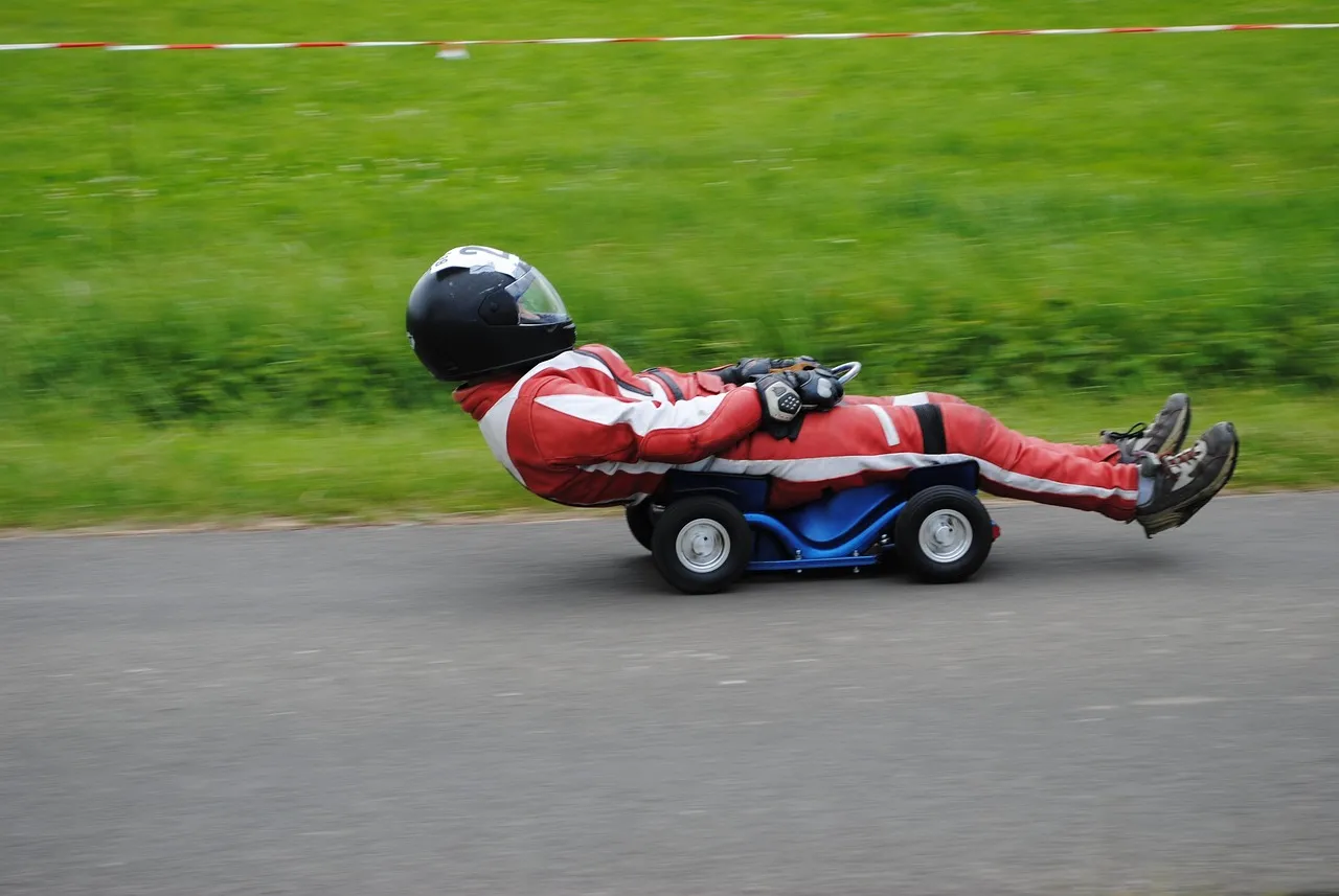 Photo showing bobby car, run, ride and race car driver.