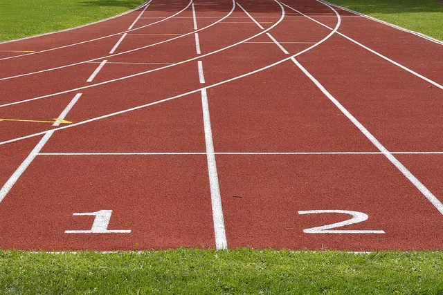 Photo showing tartan track, athletics and track and field.