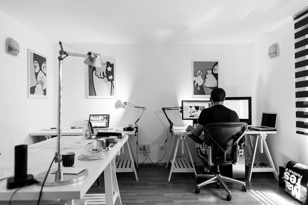 Photo showing office, work and desk.